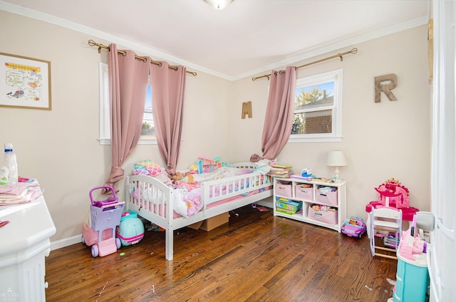 bedroom featuring dark hardwood / wood-style flooring and crown molding