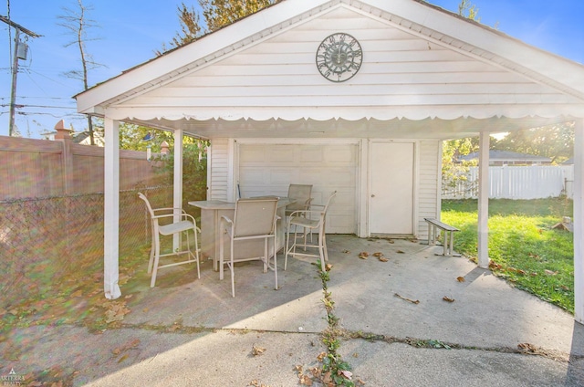 view of patio with a garage