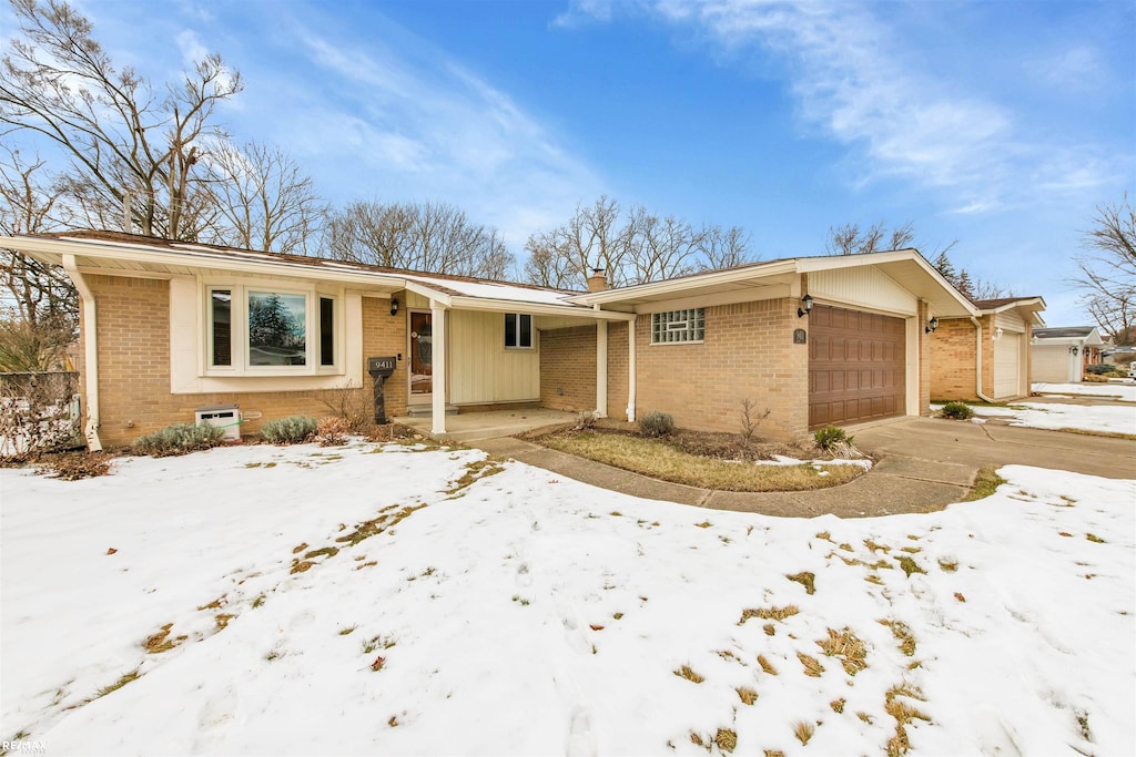 single story home with a garage