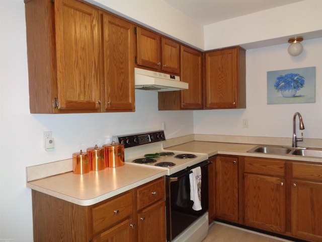 kitchen featuring sink and electric stove