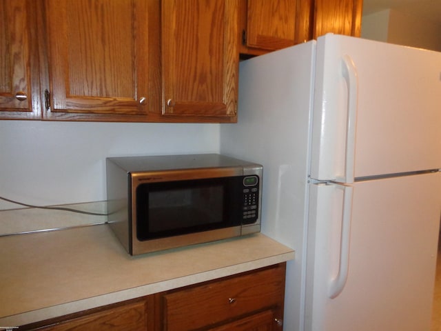 interior space with white fridge