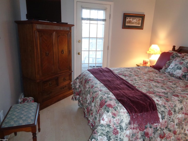 bedroom featuring hardwood / wood-style flooring