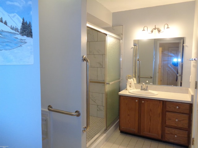 bathroom with vanity and an enclosed shower