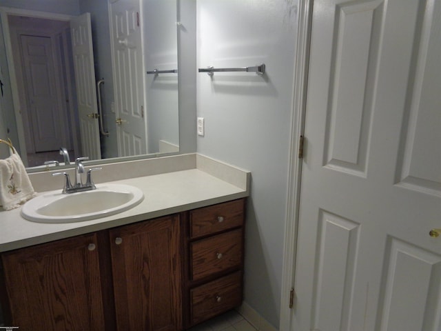 bathroom featuring vanity and tile patterned floors