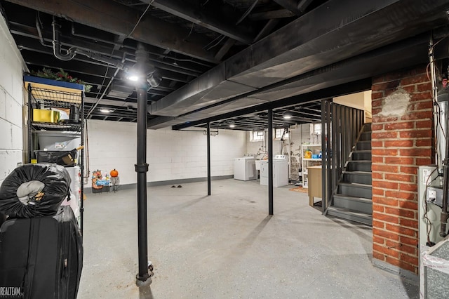 basement with washing machine and clothes dryer