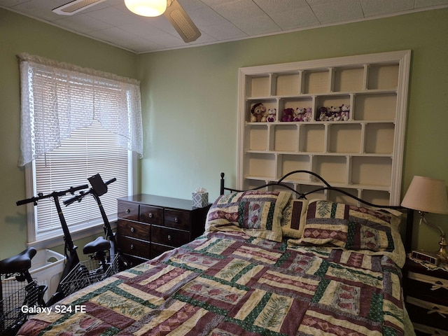 bedroom featuring ceiling fan