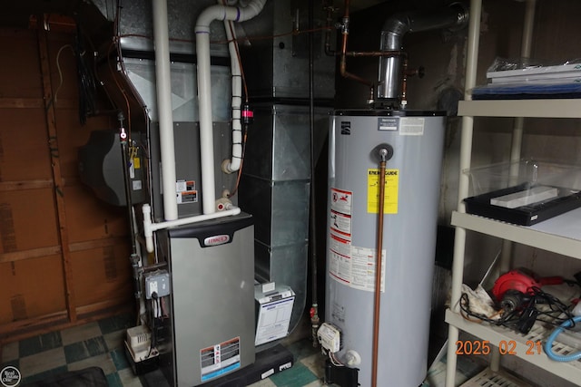 utility room featuring water heater