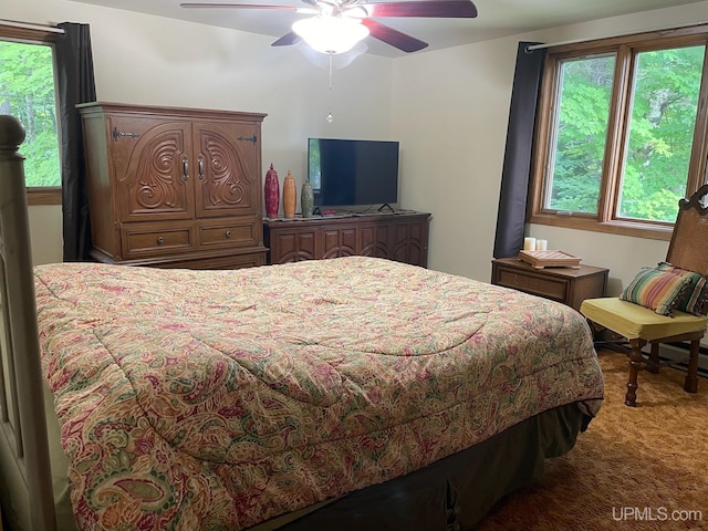 bedroom featuring carpet flooring and ceiling fan