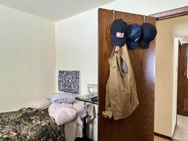 bedroom featuring visible vents