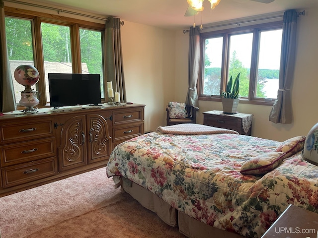 carpeted bedroom featuring access to outside