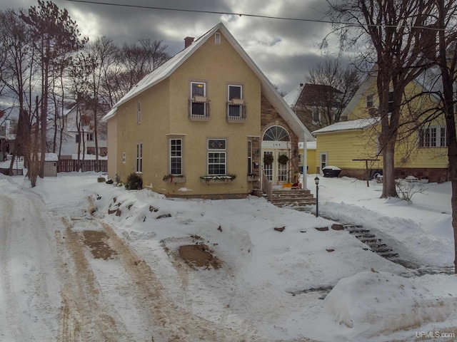 view of front of home featuring stucco siding