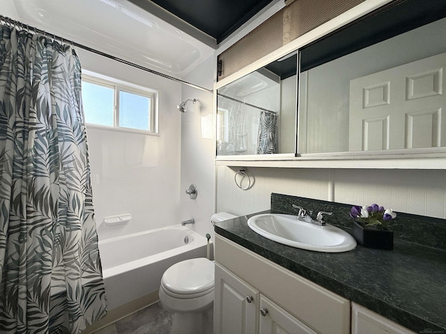 full bathroom with shower / bath combo, vanity, and toilet