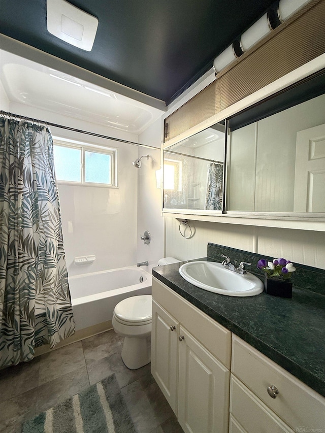 full bathroom with vanity, shower / bathtub combination with curtain, and toilet