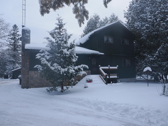 view of snow covered property