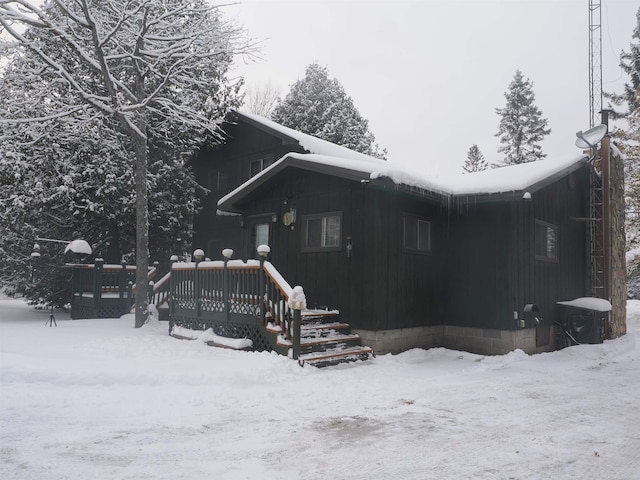 exterior space featuring a wooden deck