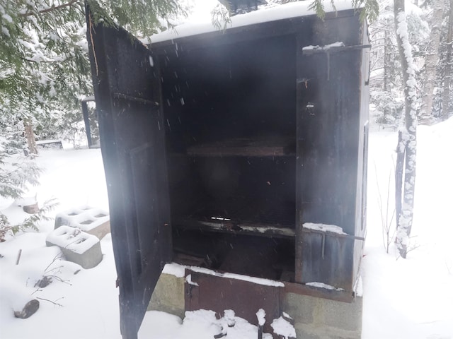 view of snow covered property entrance