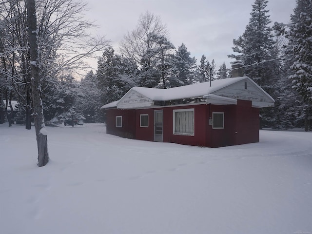view of snow covered property