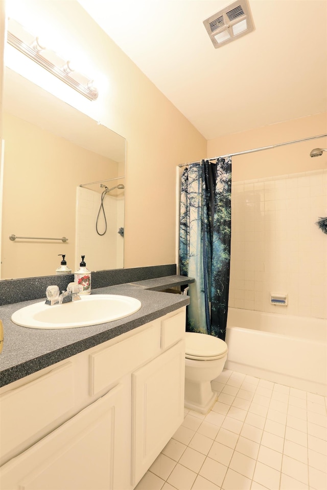 full bath featuring tile patterned flooring, toilet, vanity, visible vents, and shower / bath combo