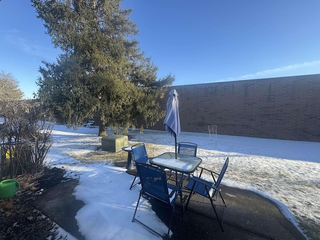 view of snow covered patio