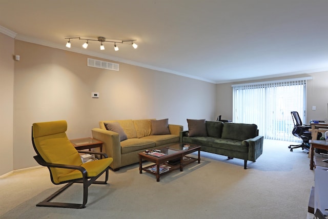 living room featuring light colored carpet, ornamental molding, and rail lighting