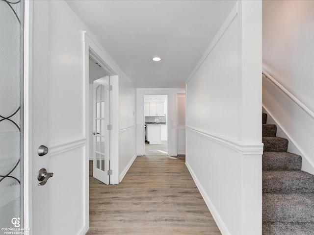 hall featuring light hardwood / wood-style flooring