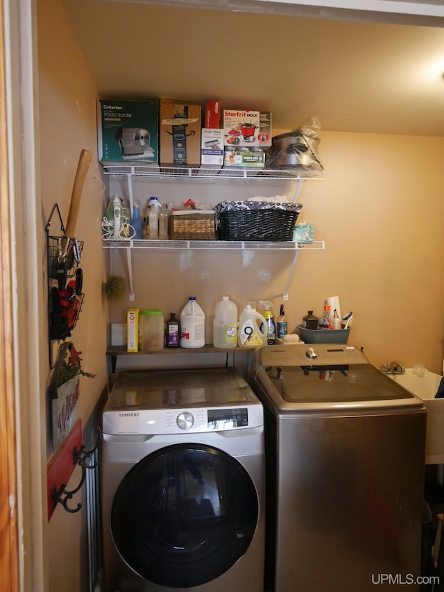 laundry area featuring washing machine and dryer