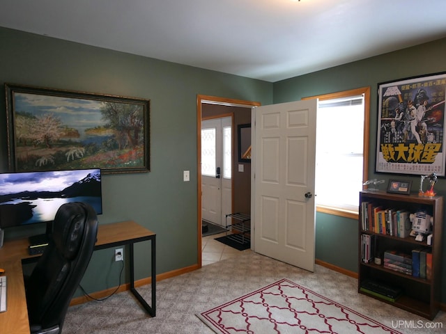 carpeted office featuring a wealth of natural light