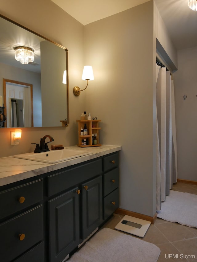 bathroom featuring vanity and tile patterned flooring