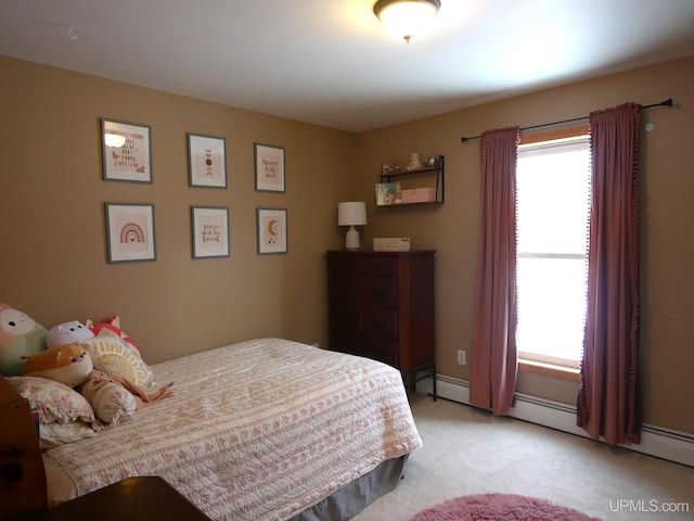 bedroom featuring light colored carpet