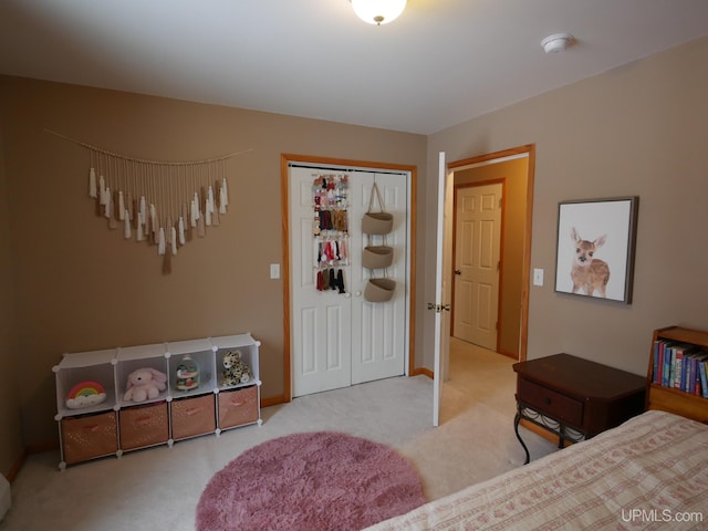 carpeted bedroom with a closet