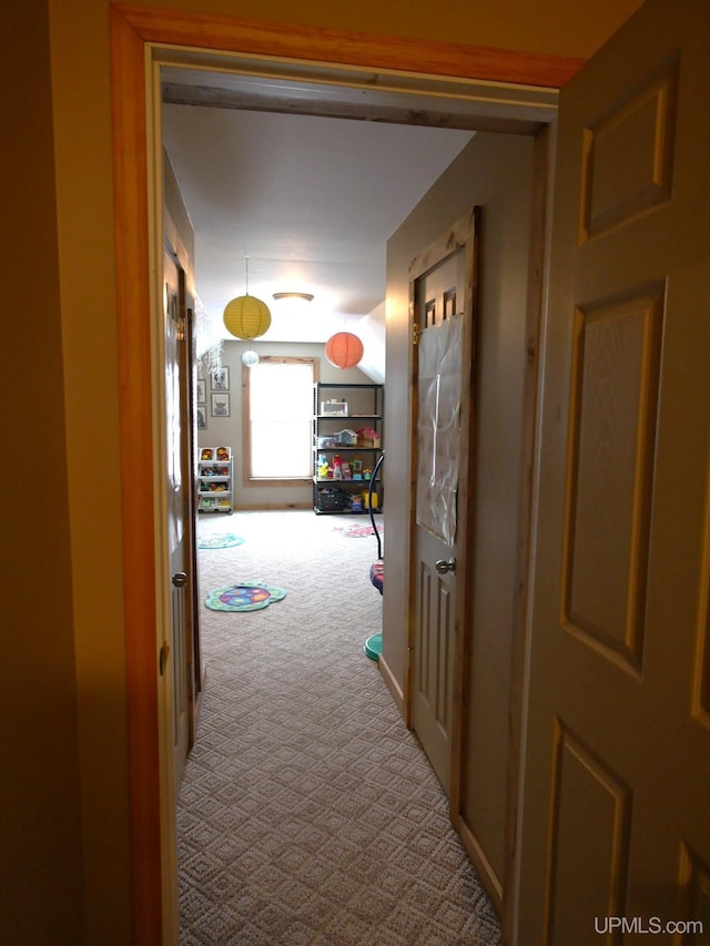 hall featuring carpet