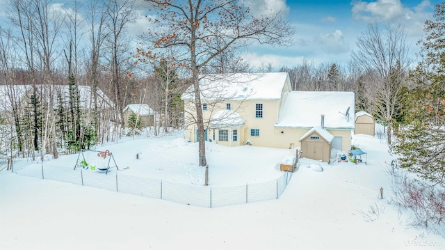 view of yard layered in snow