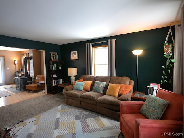 living room with a wood stove