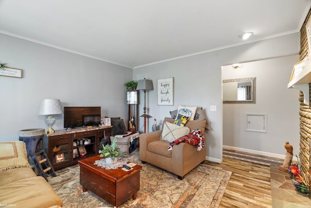 living room with crown molding and hardwood / wood-style flooring