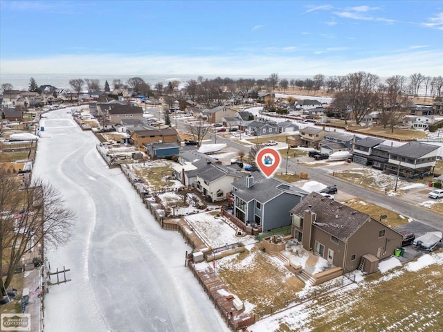 birds eye view of property with a residential view