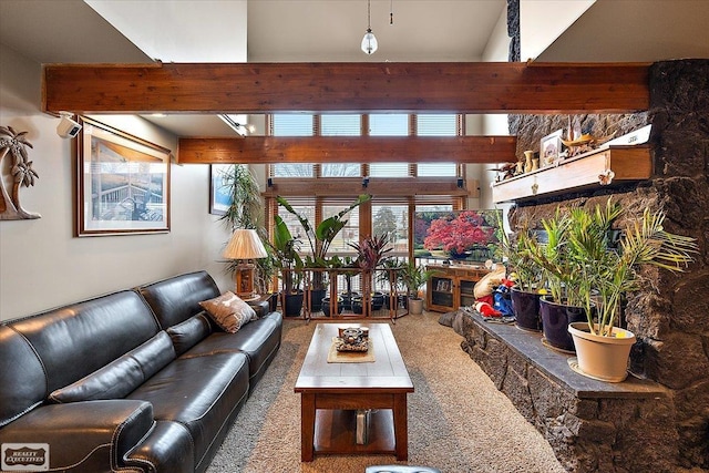 living room with beam ceiling