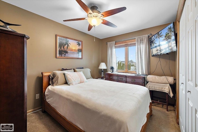 bedroom with baseboards, ceiling fan, and carpet flooring