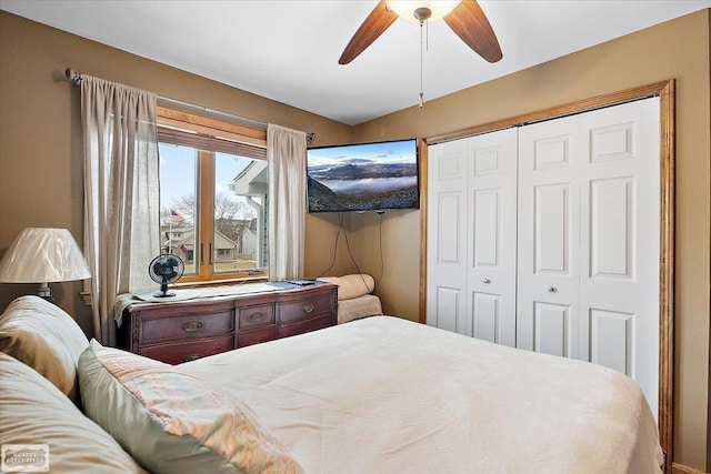 bedroom featuring a ceiling fan and a closet