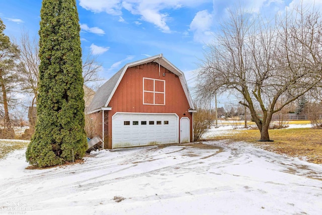 view of snow covered garage