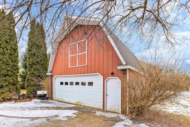 view of snow covered garage