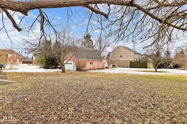 view of yard with a garage