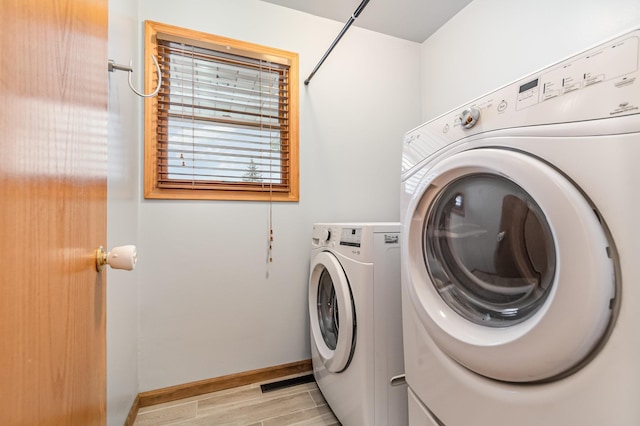 laundry area featuring separate washer and dryer