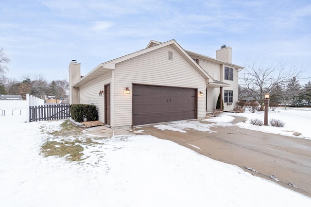 view of front of property with a garage