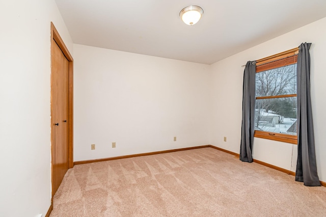 view of carpeted spare room