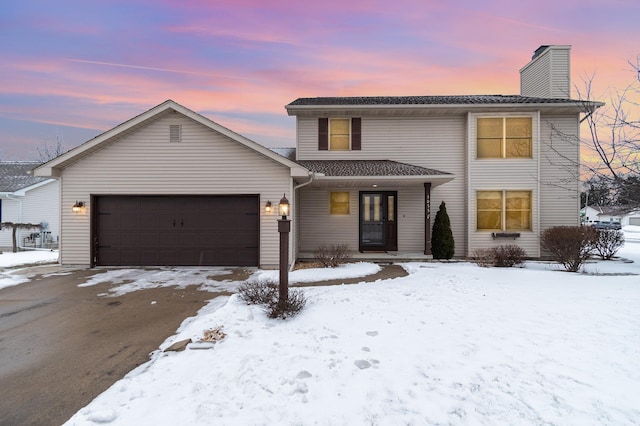 view of front of house with a garage