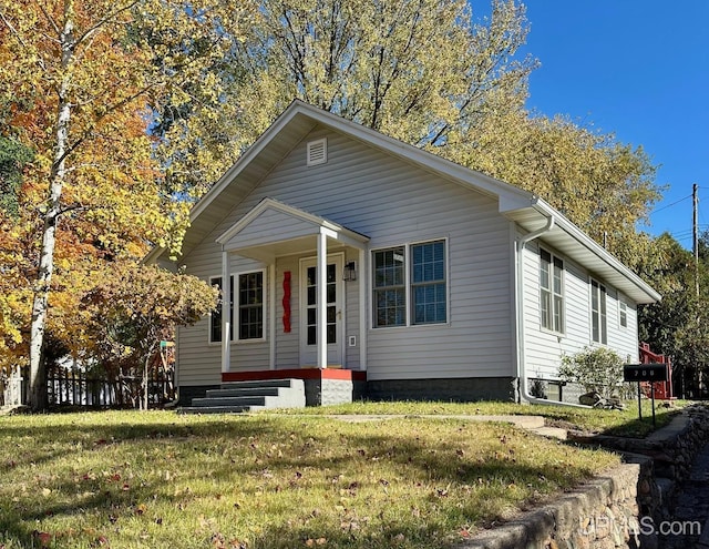 view of front of property with a front yard