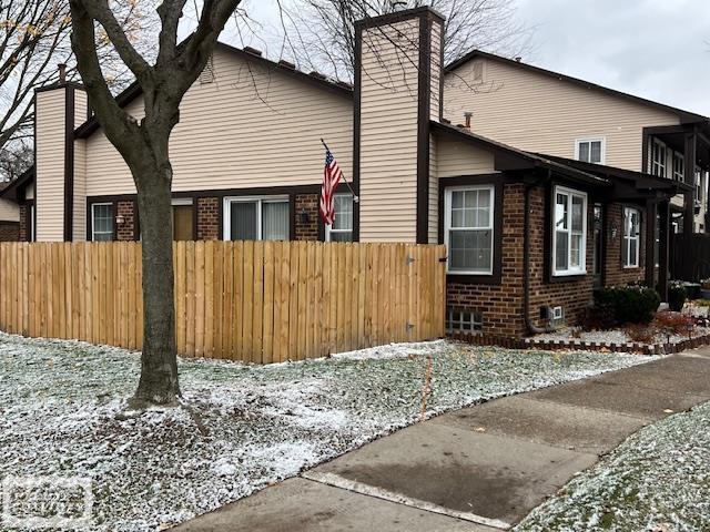 view of snow covered property