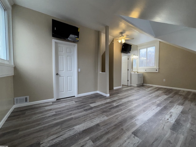 additional living space featuring ceiling fan and wood-type flooring