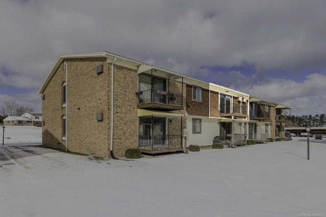 view of snow covered property