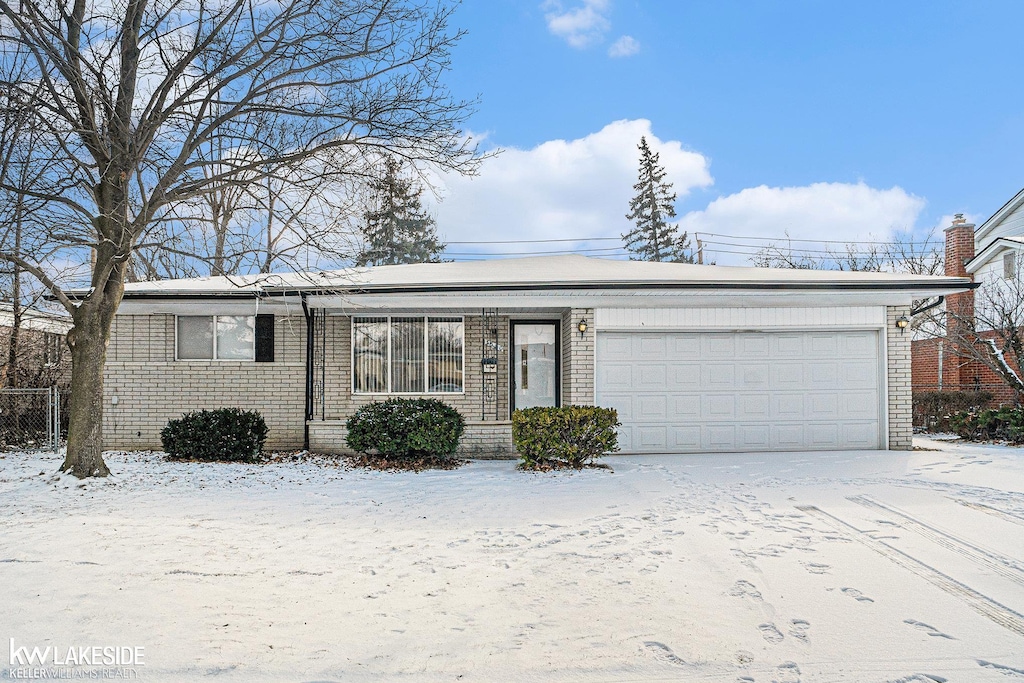 single story home with a garage